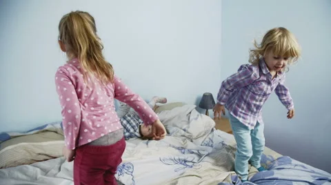 Kids Jumping on Bed Stock Footage 49764862