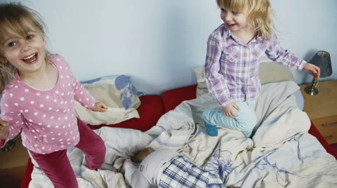 Kids Jumping on Bed Stock Footage 49766138