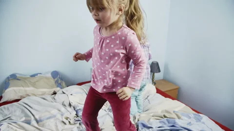 Kids Jumping on Bed Stock Footage 49767306