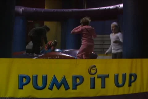 Kids Jumping in Inflatable Arena Stock Footage 10704779