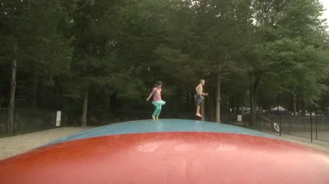 Kids jumping on large trampoline. Stock Footage 11151777