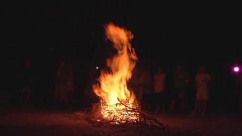 KIDS JUMPING OVER FIRE IN FEAST OF KLYDONAS TRADITION Video stock 145944581