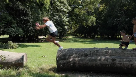 Kids jumping at the park Video stock 114170850