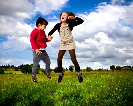 Kids jumping Stock Photos