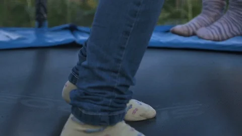 Kids jumping on trampoline Stock Footage 106202621