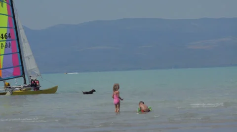 Kids at the Lake 2 Stock Footage 28764288