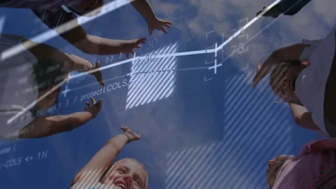 Kids leaning around camera joining hands, starting grid data and code overlays Stock Footage 313330328
