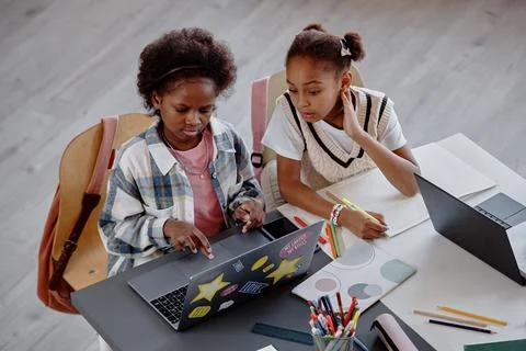 Kids Learning in Group of Two on Computer Stock Photos