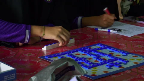 Kids learning math by collared board game in Muslim school Stock Footage 235421888