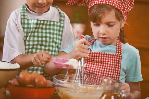 Kids make mess in the kitchen Stock Photos