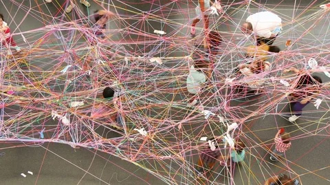 Kids making a colorful net of wool Stock-Footage 80541941