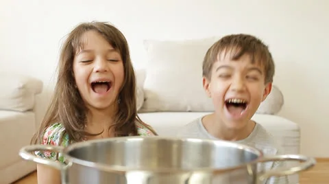 Kids making popcorn by themselves. Stock Footage 22899740