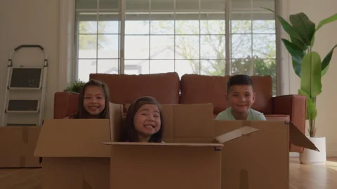 Kids Play in Moving Boxes Stock Footage 270399656