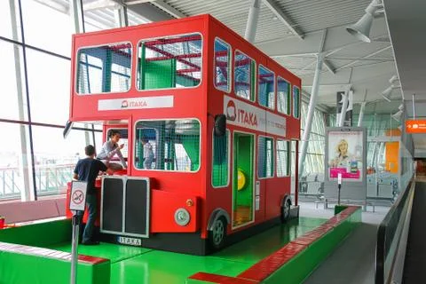 Kids playground-bus in Warsaw Chopin Airport, Poland Stock Photos