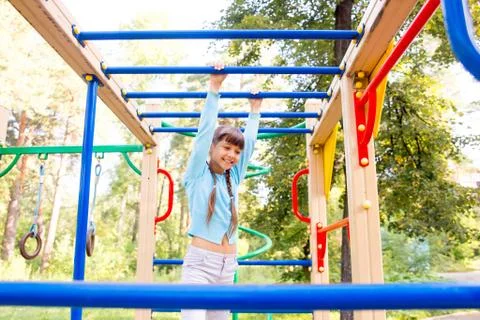 Kids on playground Stock Photos