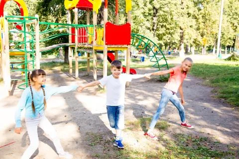 Kids on playground Stock Photos