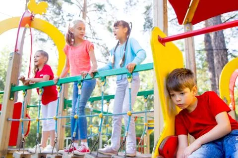 Kids on playground Stock Photos