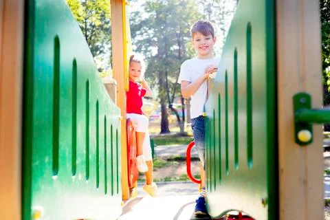 Kids on playground Stock Photos