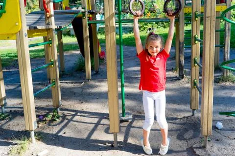 Kids on playground Stock Photos