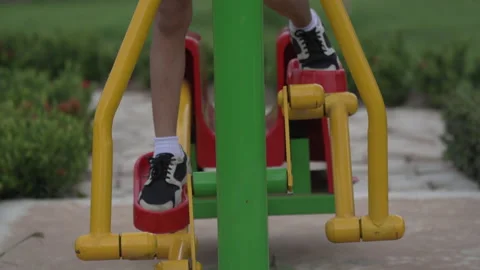 Kids playing and exercing on public outdoor gym park Stock Footage 135540868