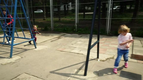 Kids Playing and Having Fun on Playground Stock Footage 63277154