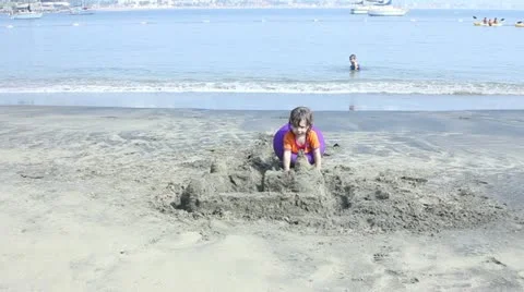 Kids playing on the beach Stock Footage 11630269