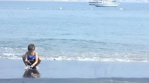 Kids playing on the beach Stock Footage 11630372