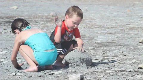 Kids playing on beach Stock Footage 27067372