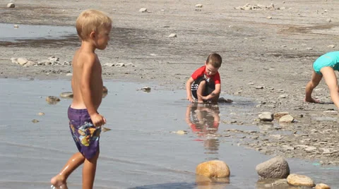 Kids playing on beach Stock Footage 27067473
