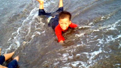 Kids Playing on the Beach Video stock 40859642