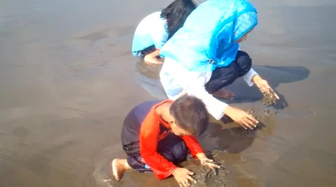 Kids Playing on the Beach Stock Footage 40874114