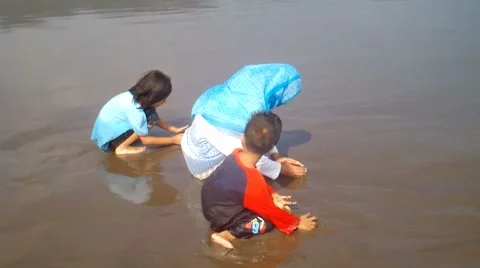 Kids Playing on the Beach Stock Footage 40874152