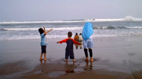 Kids Playing on the Beach Stock Footage 41074222