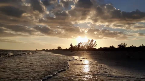 Kids Playing on Beach Stock Footage 149612675