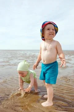 Kids playing at the beach . Foto stock