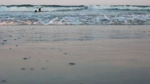 Kids Playing in Beach Waves Stock Footage 115209232