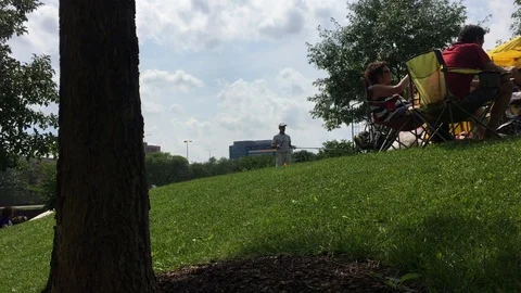 Kids Playing with Bubbles in Park Stock Footage 129054227