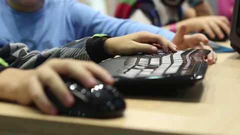 Kids playing on the computer Stock Footage 73267498