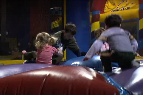 Kids Playing on Inflatable Platform Stock Footage 10704695