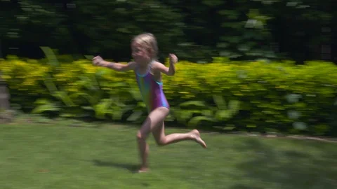 Kids playing in an inflatable pool Stock Footage 112945872