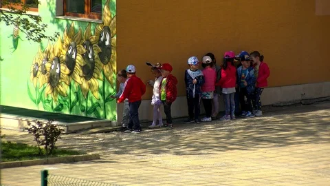 Kids playing in kindergarten yard Stock Footage 88948372