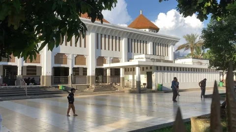Kids playing on the mosque yard during Ramadan season. Stock Footage 238019006