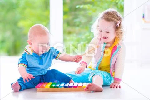 Kids Playing Music With Xylophone