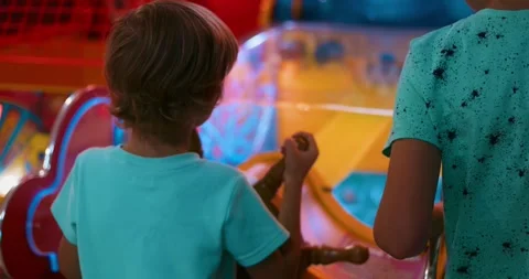 Kids Playing Pirate Game at Arcade Stock Footage 306527028
