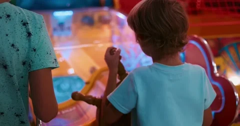 Kids Playing Pirate Game at Arcade Stock Footage 307755894