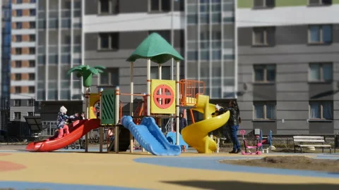 Kids playing at the playground Stock Footage 106416515