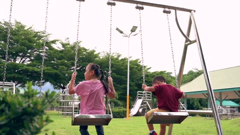 The kids playing in the playground. 스톡 동영상 143473783