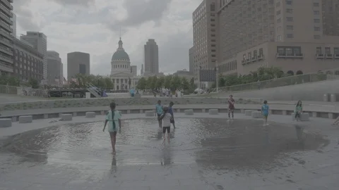 Kids Playing in Pond at Gateway Arch Stock Footage