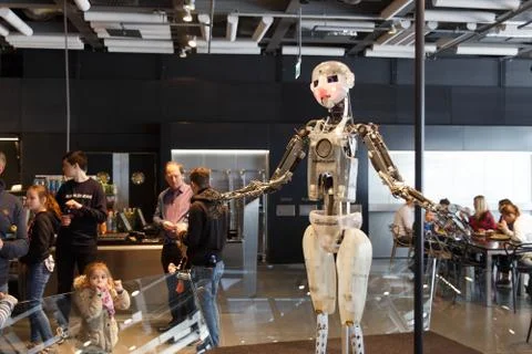 Kids playing with prototype of robot Stock Photos