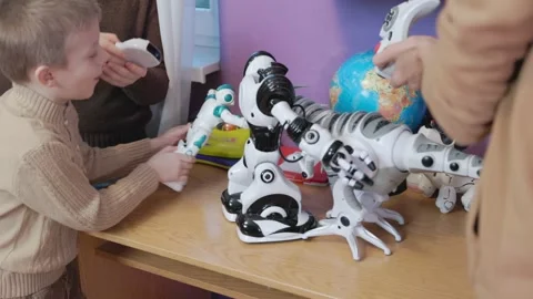Kids playing with robots Stock Footage 170023796